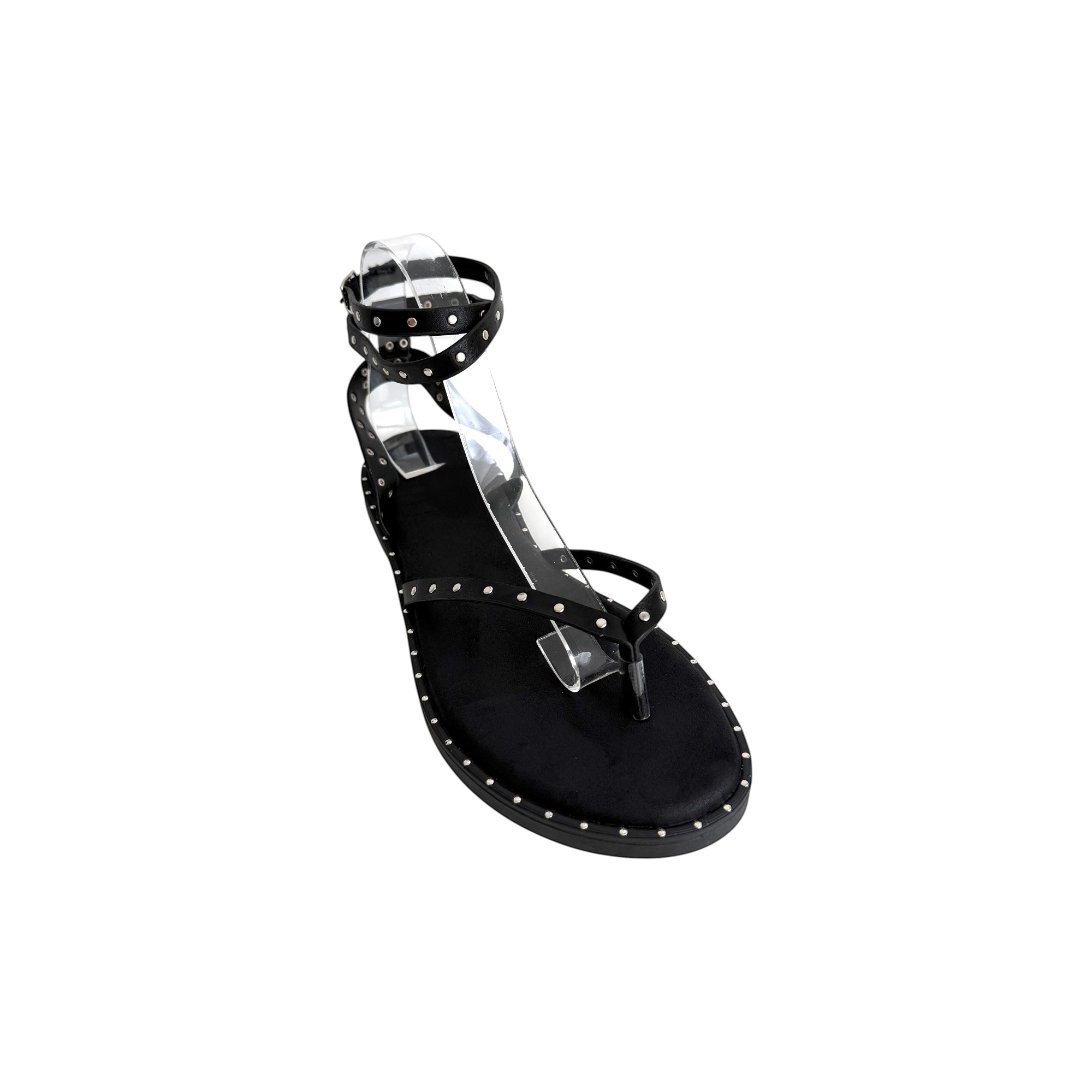 JESSICA black Roman sandals with ankle strap and silver stud details. Flat sole, thong toe.